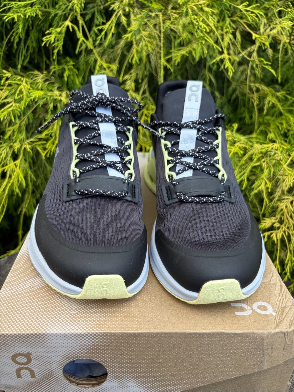 On Running Men's Black Sneakers with Light Green Accents